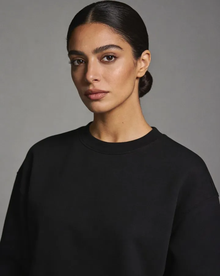 Ines Carvalho, director of digital experiences at Signalform, photographed against a plain gray backdrop